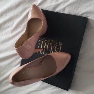 A pair of beautiful blush pink pumps